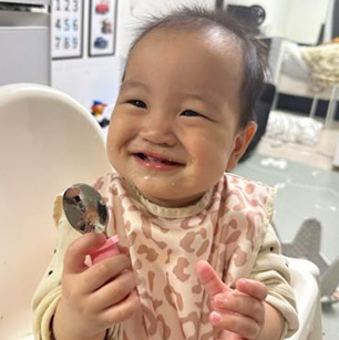 離乳食が美味しかったのか、ニコニコのういちゃん。